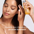 elizabeth-arden-eight-hour-huile-miracle-100ml-brillance-cheveux-fr.png	Femme lissant ses cheveux avec l’huile Eight Hour Elizabeth Arden, pour apporter de la brillance aux cheveux secs.