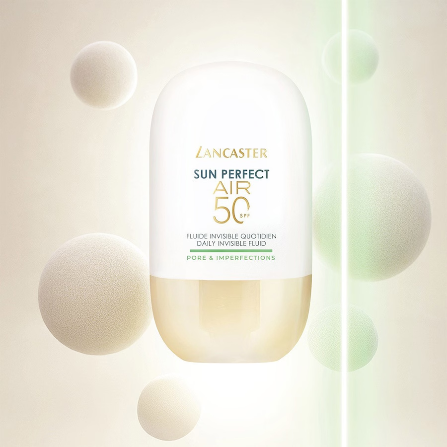 lancaster-air-pores-imperfections-spf50-40ml-fond-vert.png	Fluide Lancaster Sun Perfect AIR Pores & Imperfections SPF 50 entouré de sphères sur un fond aux reflets verts.