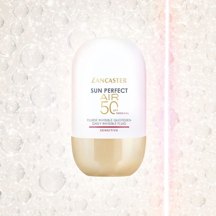lancaster-air-sensitive-mineral-spf50-40ml-bulles.png	Fluide Lancaster Sun Perfect AIR Sensitive Mineral SPF 50 entouré de bulles translucides aux reflets roses.